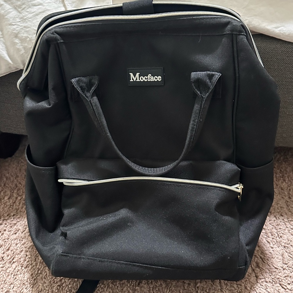 Mocface Black Backpack with Sleek Design and Durable Material